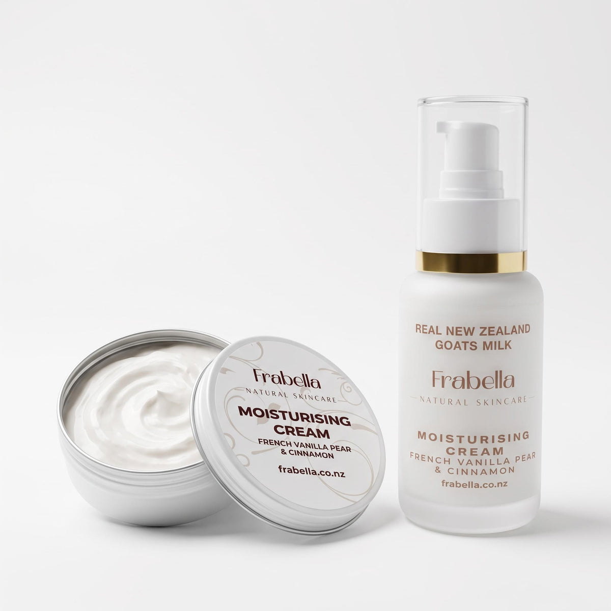 Frabella Natural Skincare moisturising cream shown with an open silver tin of white cream and a frosted white pump bottle with a gold band and clear cap on a light gray background.